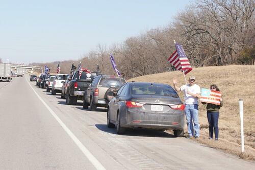 US Trucker Convoy Swells As It Moves Across Country To DC Side-of-road-1200x800