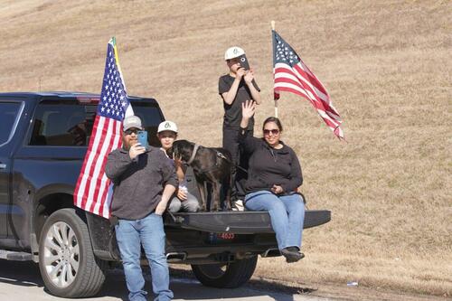 US Trucker Convoy Swells As It Moves Across Country To DC Supporters-1200x800